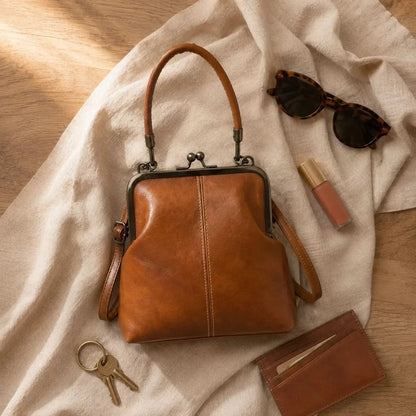 Kyla | Bolso bandolera con cierre de boquilla y asas para mujer